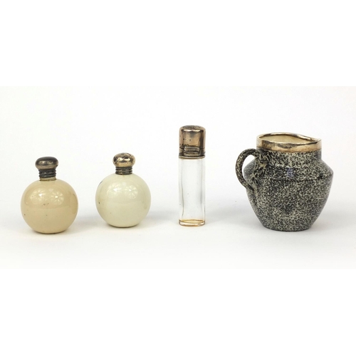 2441 - Three silver topped souvenir china items, together with a silver topped scent bottle, the souvenir c... 