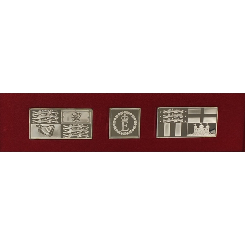 2412 - The Royal Standards Queen Silver Jubilee silver stamp ingots comprising The Royal Standard Queen Eli... 