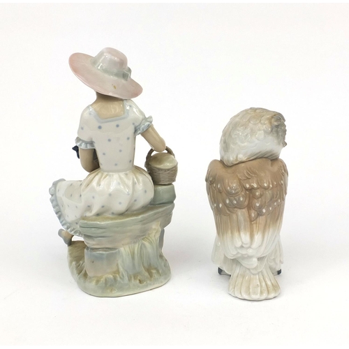 2127 - Nao figure of a seated girl feeding a chicken and a Nao owl, both with factory marks to the bases, t... 