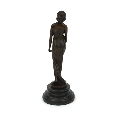 2266 - Bronze study of an Art Nouveau lady wearing a flowing dress, raised on a faux marble base, 19.5cm hi... 