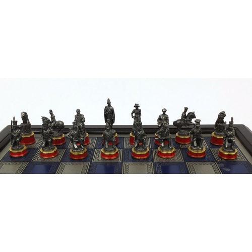 2197 - Franklin Mint battle of Waterloo chess set and board with lead chess pieces, the largest 6cm high