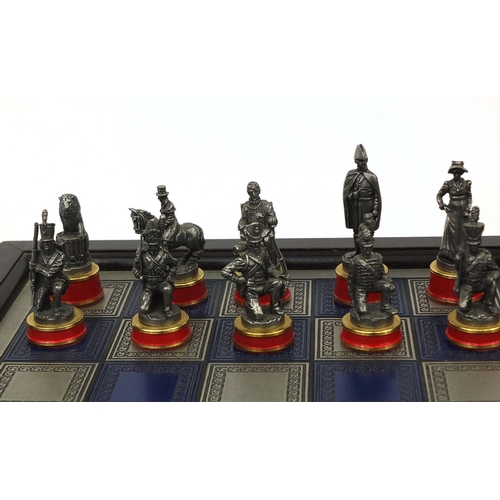 2197 - Franklin Mint battle of Waterloo chess set and board with lead chess pieces, the largest 6cm high