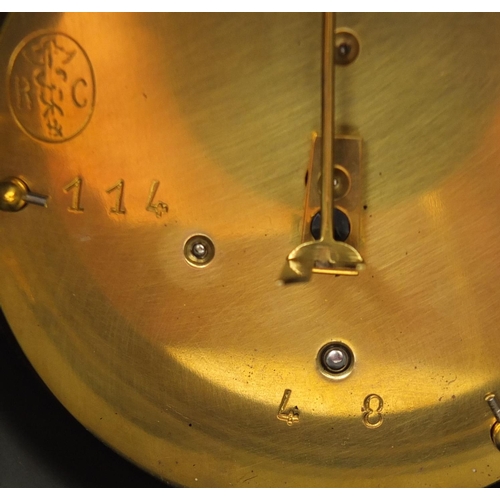 2199 - John Ferrier of London black slate and marble mantle clock with enamelled dial and Roman numerals, 2... 