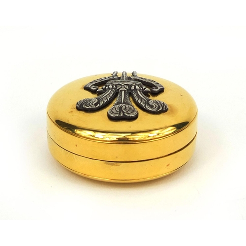 2424 - Circular silver gilt pill box with Prince of Wales motif, London 1981, 5cm in diameter, approximate ... 