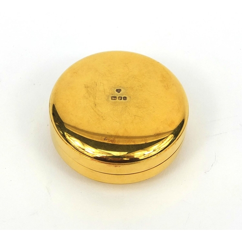 2424 - Circular silver gilt pill box with Prince of Wales motif, London 1981, 5cm in diameter, approximate ... 