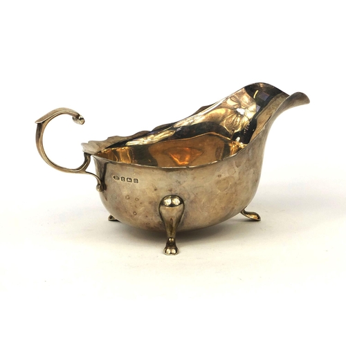 2430 - Adie Brothers silver three footed sauce boat, Birmingham 1932, 17cm long, approximate weight 152.4g