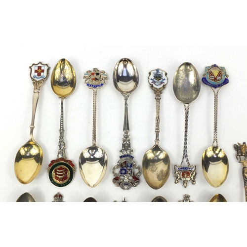 2465 - Collection of silver and enamel souvenir teaspoons including Tunbridge Wells, Middlesex, Bromley and... 