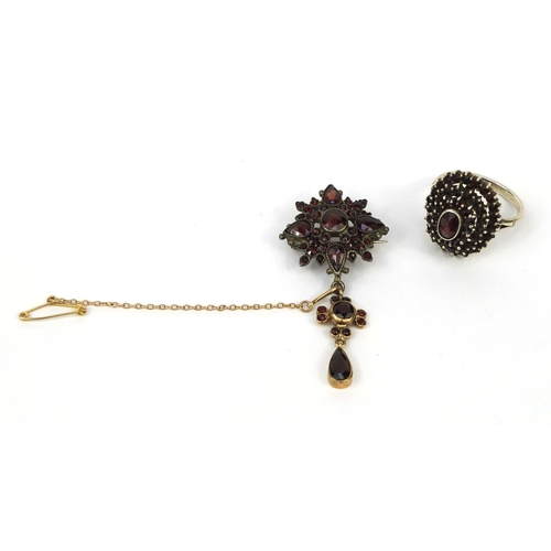 2629 - Gilt metal garnet cluster brooch and silver four tier garnet ring, size M, approximate weight 10.0g