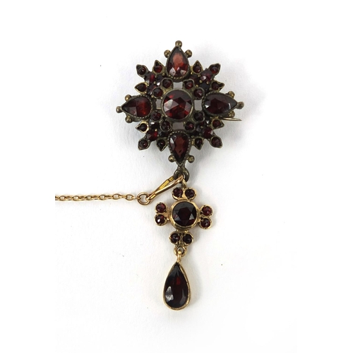 2629 - Gilt metal garnet cluster brooch and silver four tier garnet ring, size M, approximate weight 10.0g