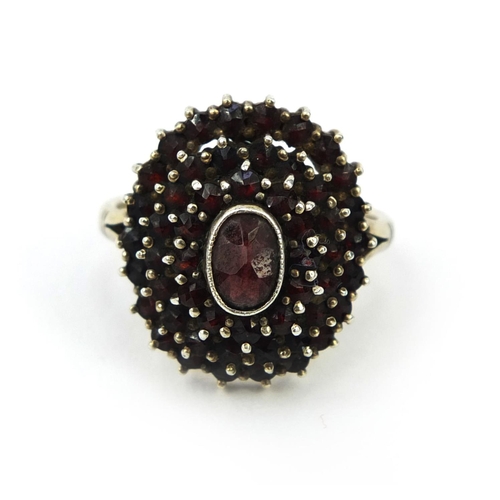 2629 - Gilt metal garnet cluster brooch and silver four tier garnet ring, size M, approximate weight 10.0g