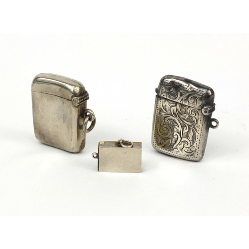 2427 - Two rectangular silver vesta's, one with floral chased decoration and a silver enamelled matchbox ch... 