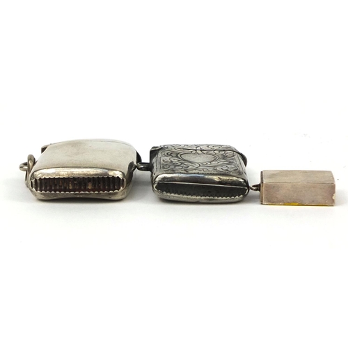 2427 - Two rectangular silver vesta's, one with floral chased decoration and a silver enamelled matchbox ch... 