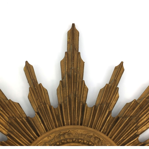 2023 - Vintage carved gilt wood sunburst design convex mirror, 56cm in diameter