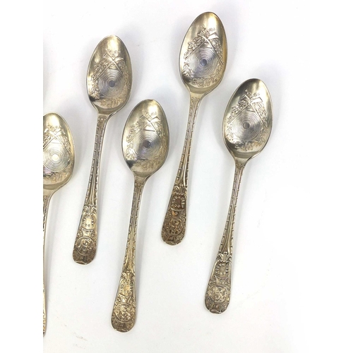 2434A - Set of seven Military interest rifle shooting club teaspoons, the bowls decorated with crossed rifle... 