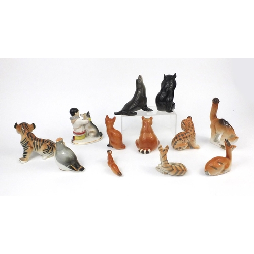 2261 - Group of Russian USSR porcelain animals including an eskimo with a husky, seal, baby zebra etc, the ... 