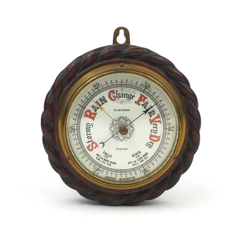 2367 - G C Bateman of Brighton oak ships design wall barometer, 19cm in diameter