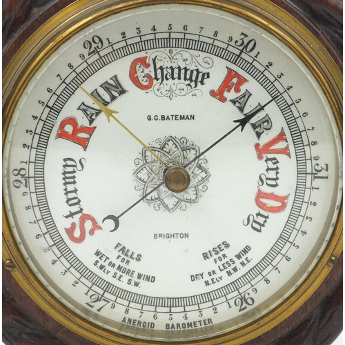 2367 - G C Bateman of Brighton oak ships design wall barometer, 19cm in diameter