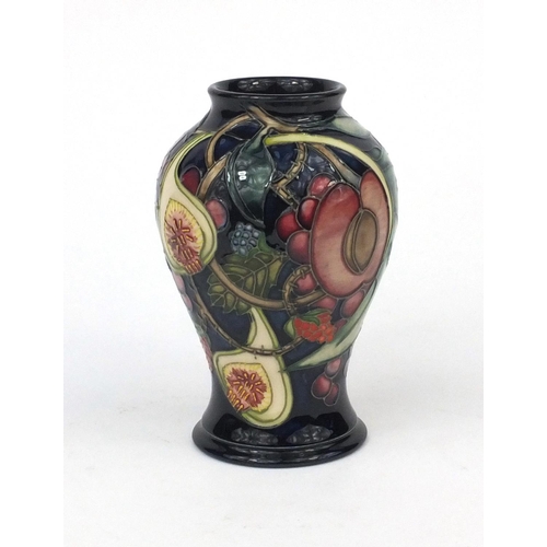 2234 - Moorcroft pottery baluster vase hand painted and tube lined with stylised fruit, factory marks, init... 