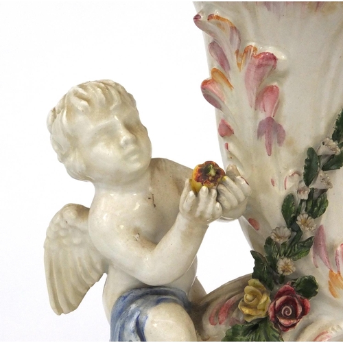 2363 - Continental table lamp, decorated with two cherubs and flowers, lamp base 33cm high