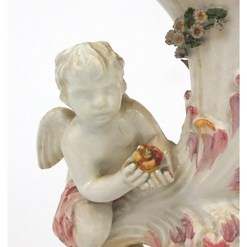 2363 - Continental table lamp, decorated with two cherubs and flowers, lamp base 33cm high