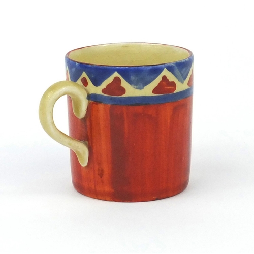 2142 - Newport Pottery Bizarre coffee can with hand painted geometric decoration, factory mark to the base,... 