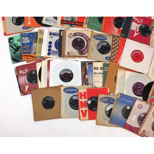 2304 - Group of 45rpm rock and roll vinyl records including Eddie Cochran and Billy Fury examples