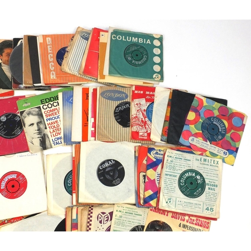 2304 - Group of 45rpm rock and roll vinyl records including Eddie Cochran and Billy Fury examples