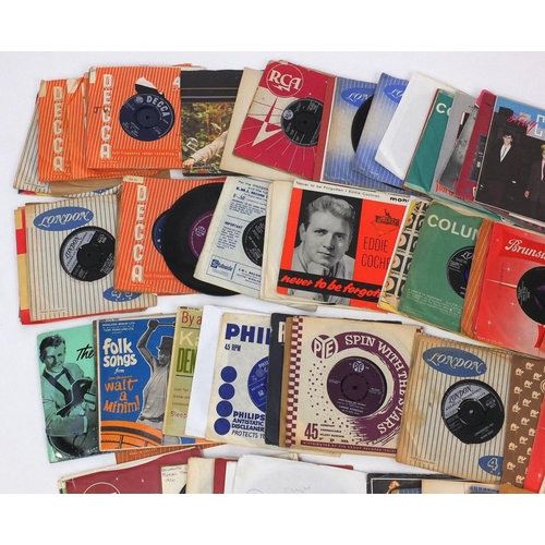 2304 - Group of 45rpm rock and roll vinyl records including Eddie Cochran and Billy Fury examples