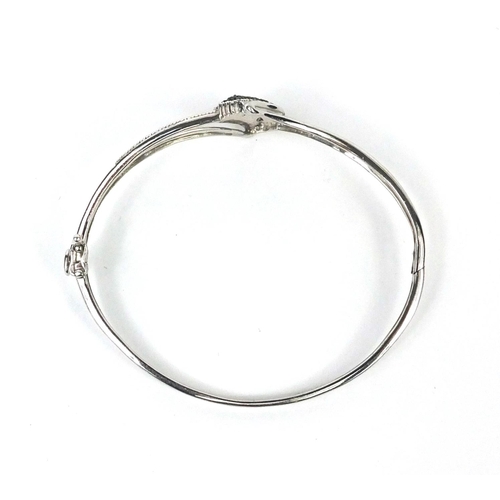 2557 - Stylish silver bangle set with blue and white diamonds, 6.5cm long, approximate weight 10.4g