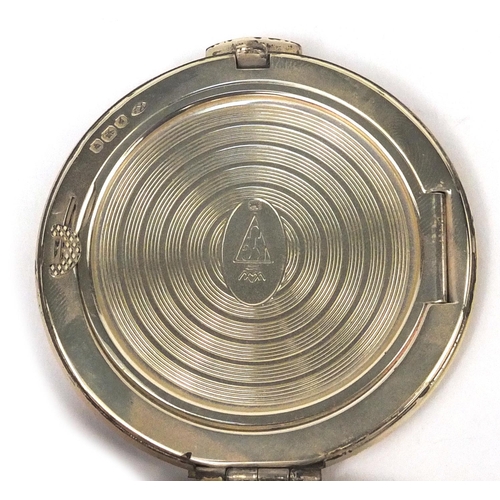 2442 - Circular silver compact with engine turned decoration, London 1950, 6cm in diameter, approximate wei... 