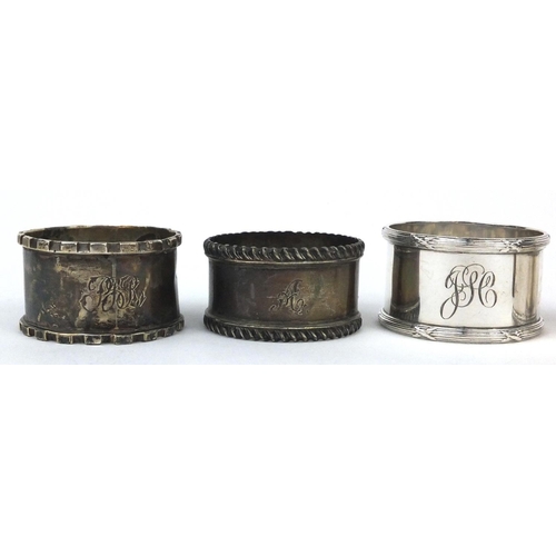 2477 - Five assorted circular silver napkin rings, one with engine turned decoration, various hallmarks, ap... 