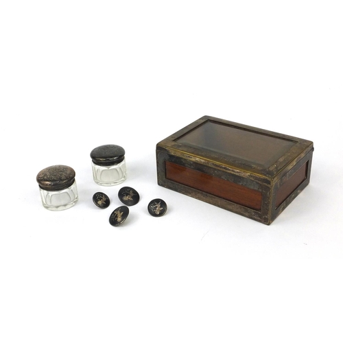 2454 - Four Siam silver buttons, silver plated wooden and bevelled glass WMF box and two silver topped glas... 