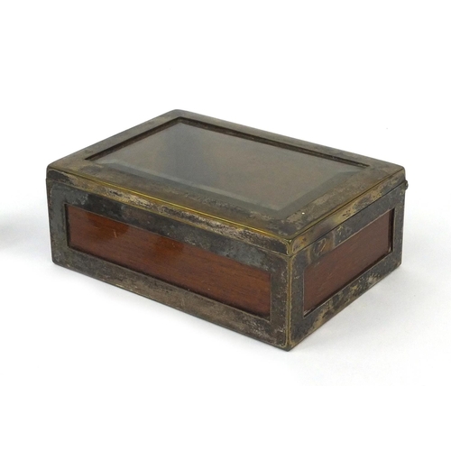 2454 - Four Siam silver buttons, silver plated wooden and bevelled glass WMF box and two silver topped glas... 