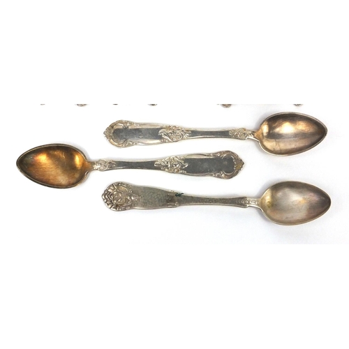 2478A - Set of eight silver teaspoons, Sheffield hallmarked, together with three other white metal teaspoons... 