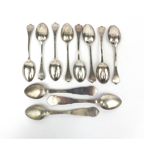 2478A - Set of eight silver teaspoons, Sheffield hallmarked, together with three other white metal teaspoons... 