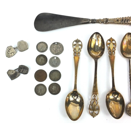 2471 - Silver items comprising set of four teaspoons, silver handled shoe horn, pair of antique coin cuff l... 