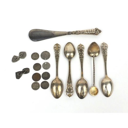 2471 - Silver items comprising set of four teaspoons, silver handled shoe horn, pair of antique coin cuff l... 