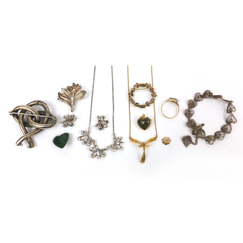 2643 - Assorted jewellery including a 9ct gold diamond crossover ring, silver necklaces, a wreath brooch et... 