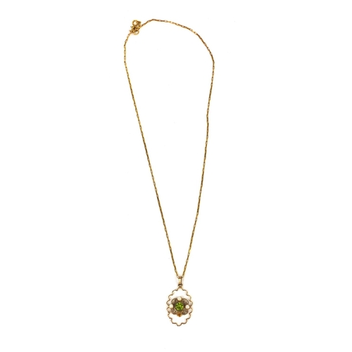 2646 - 9ct gold green stone and seed pearl pendant on a 9ct gold necklace, the pendant 3.2cm long, approxim... 