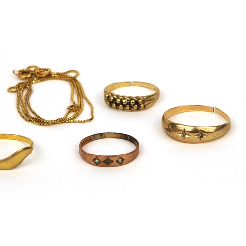 2546 - Broken 9ct gold jewellery comprising a necklace and three rings, together with a pair of gold colour... 