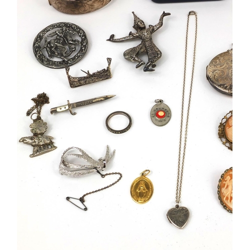 2641 - Assorted costume jewellery including a large circular silver locket with floral chased decoration, s... 