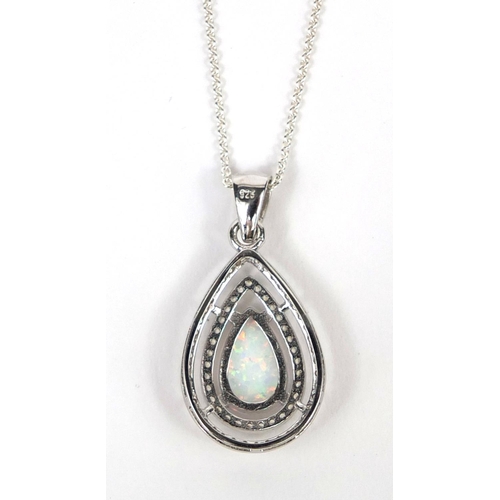 2663 - Silver opalite and cubic zirconia pendant on a silver necklace