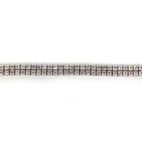 2581 - Silver cubic zirconia double row bracelet, 17cm long, approximate weight 15.5g