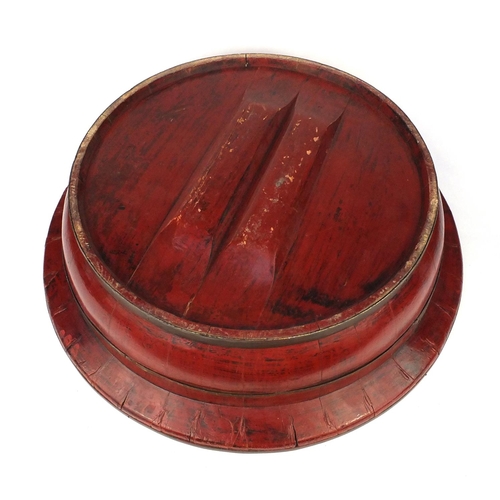 2068 - Large red lacquered metal bound bowl, 70cm diameter