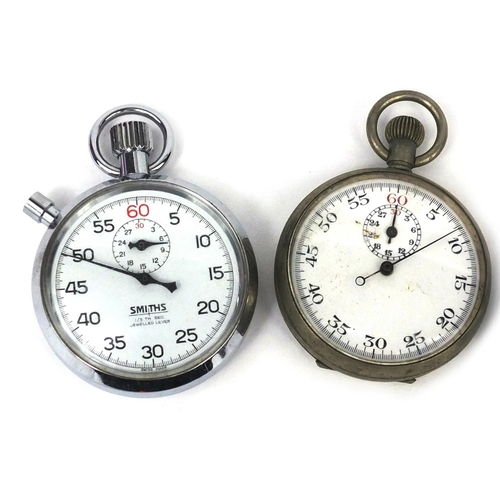 2669 - Four white metal stop watches including a Smiths example