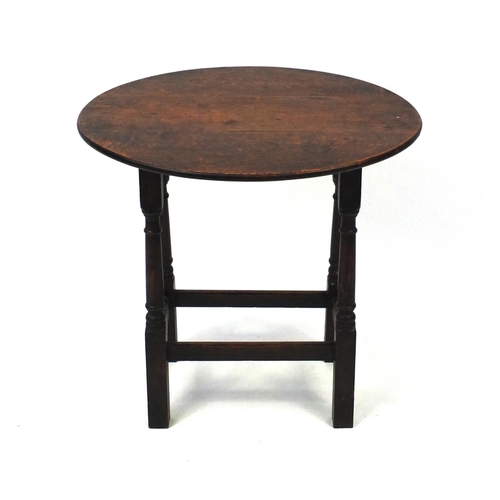 2062 - Antique oval oak drop leaf occasional table, 56cm high x 60cm wide extended x 57cm deep