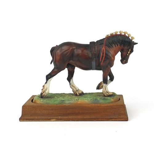 2104 - Hereford limited edition china Shire horse on wooden base, numbered 162/250, factory marks to the ba... 