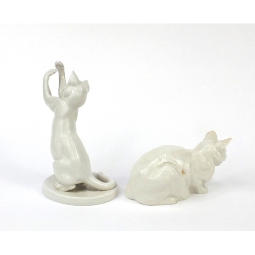 2180 - Two Nymphenburg porcelain cats including one seated, each with factory marks to the bases, one numbe... 