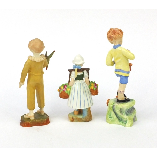 2160 - Three Royal Worcester figurines comprising Dutch Girl 2922, The Parakeet 3087 and October 3417, mode... 