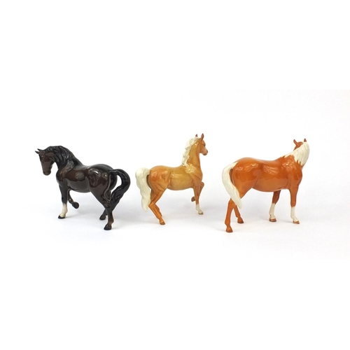 2116 - Three Beswick horses comprising two tan and one brown example, the largest 18cm high